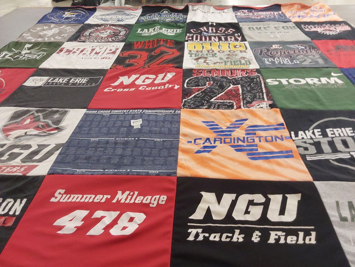 T-shirt quilt featuring lake erie storm, north greenville university cross country by Zoie from SC