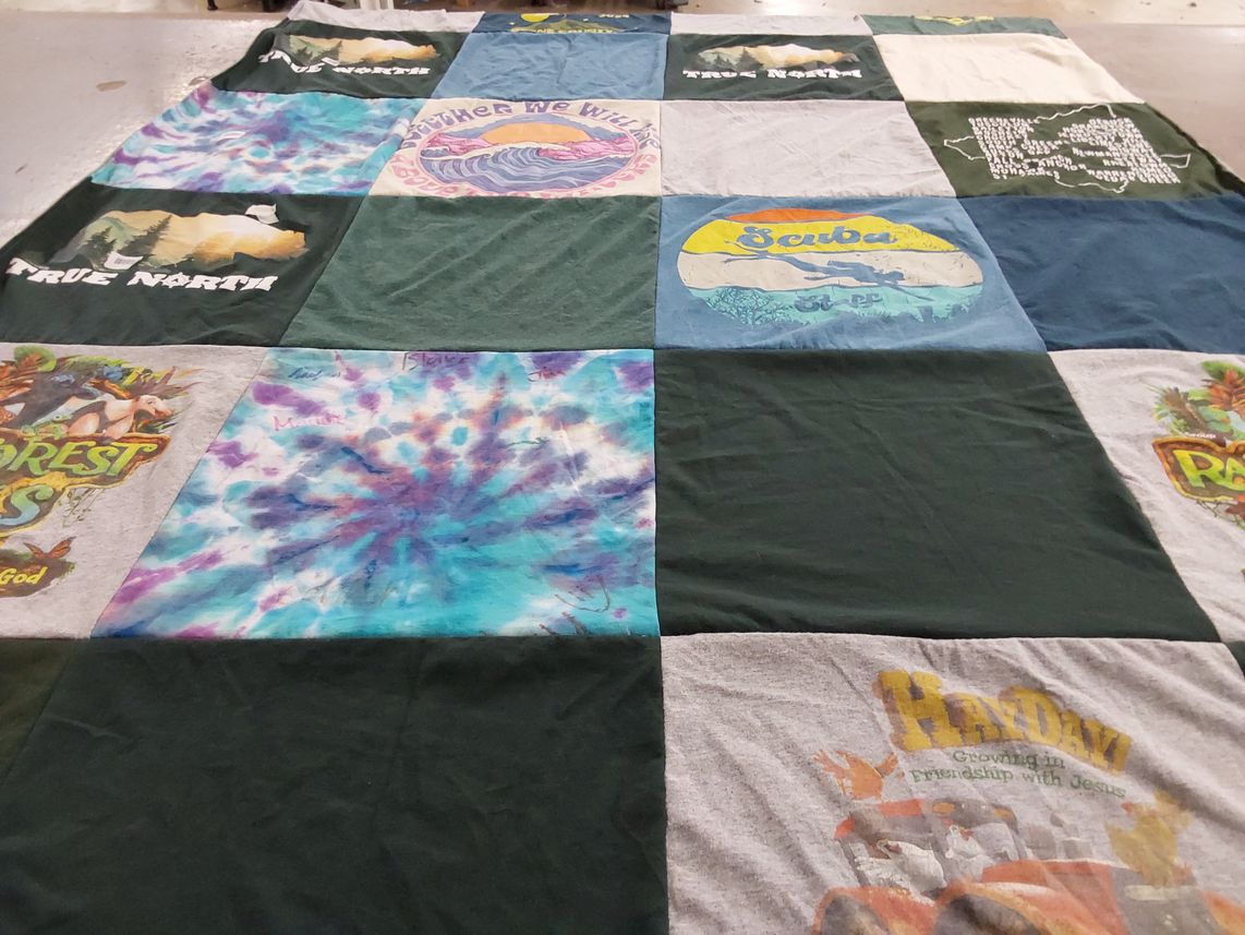 T-shirt quilt with nature, scuba diving themes by Kelly from TN