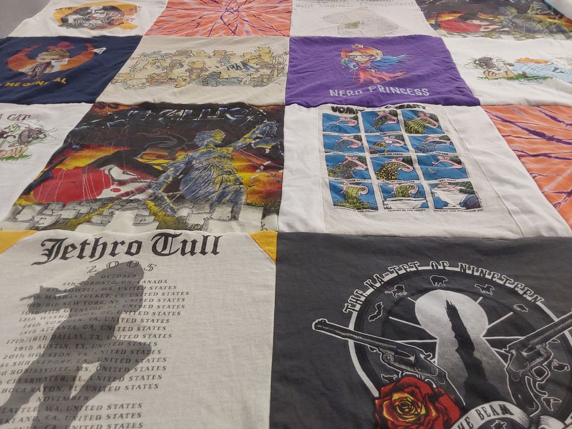 T-shirt quilt with music, comics themes by Stacie from WA