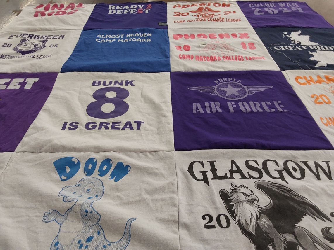 T-shirt quilt with camping, college themes by Bertha from MA