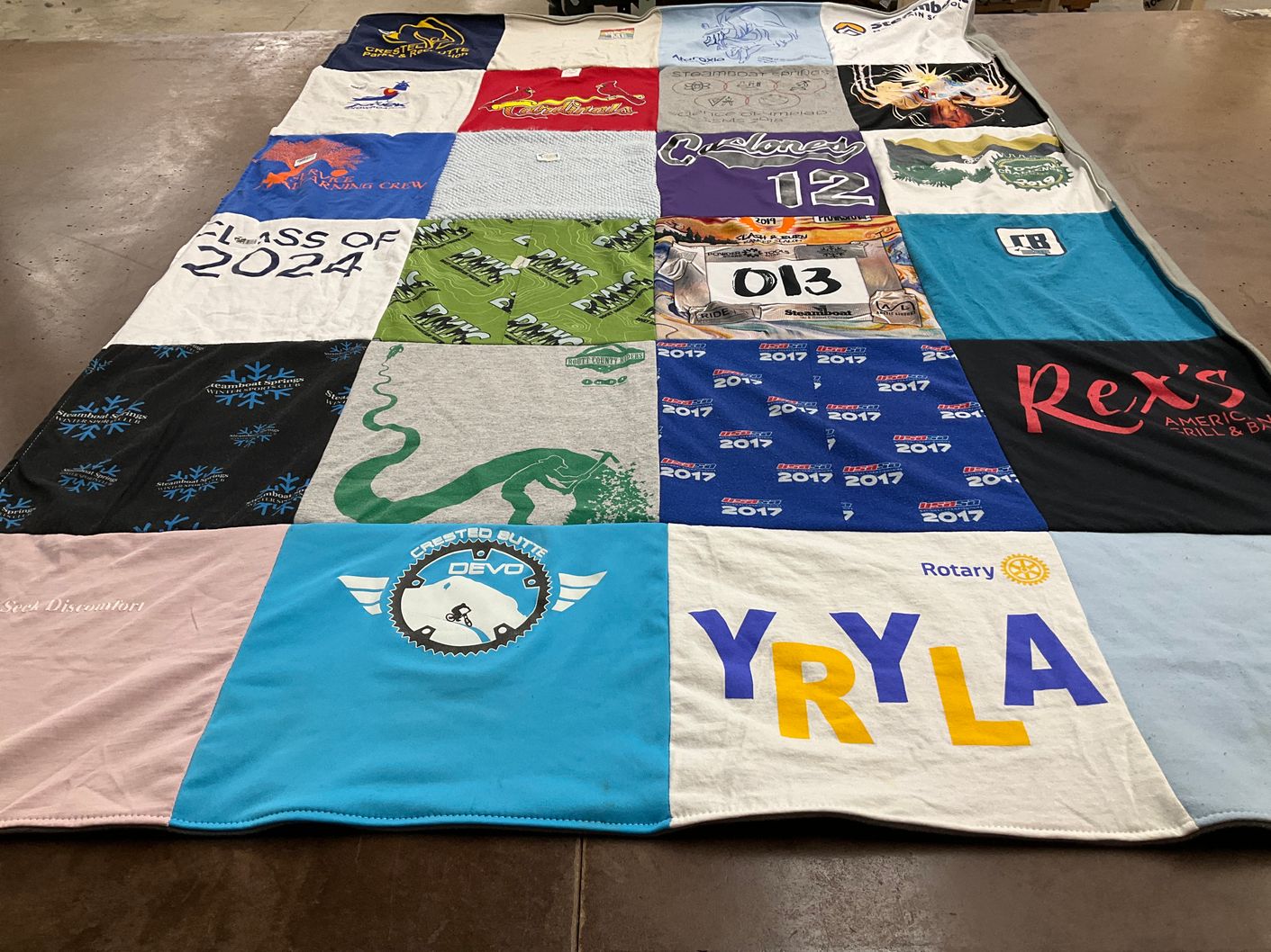 T-shirt quilt with community service, graduation themes by Steve from CO