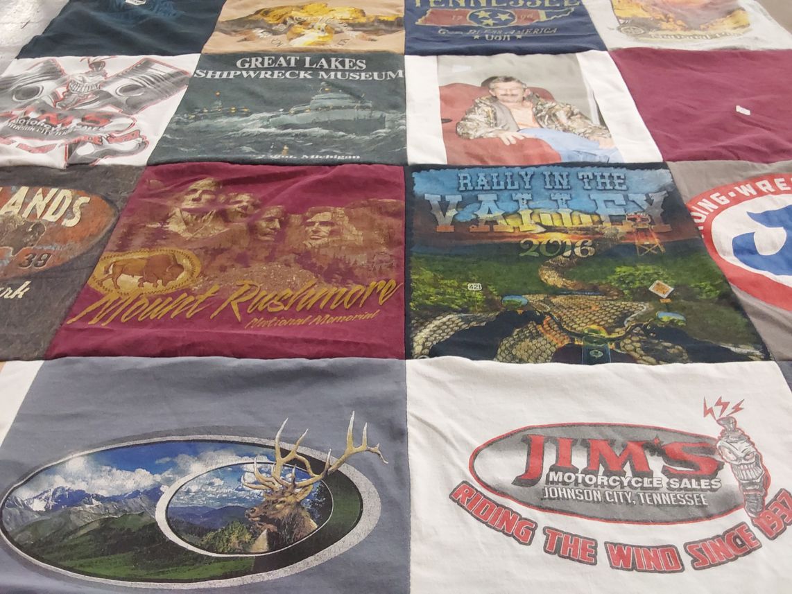T-shirt quilt with motorcycling, tourism themes by Erica from NC
