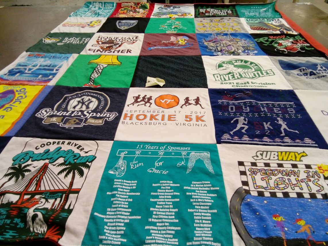 T-shirt quilt with running, sports themes by Wayne  from VA