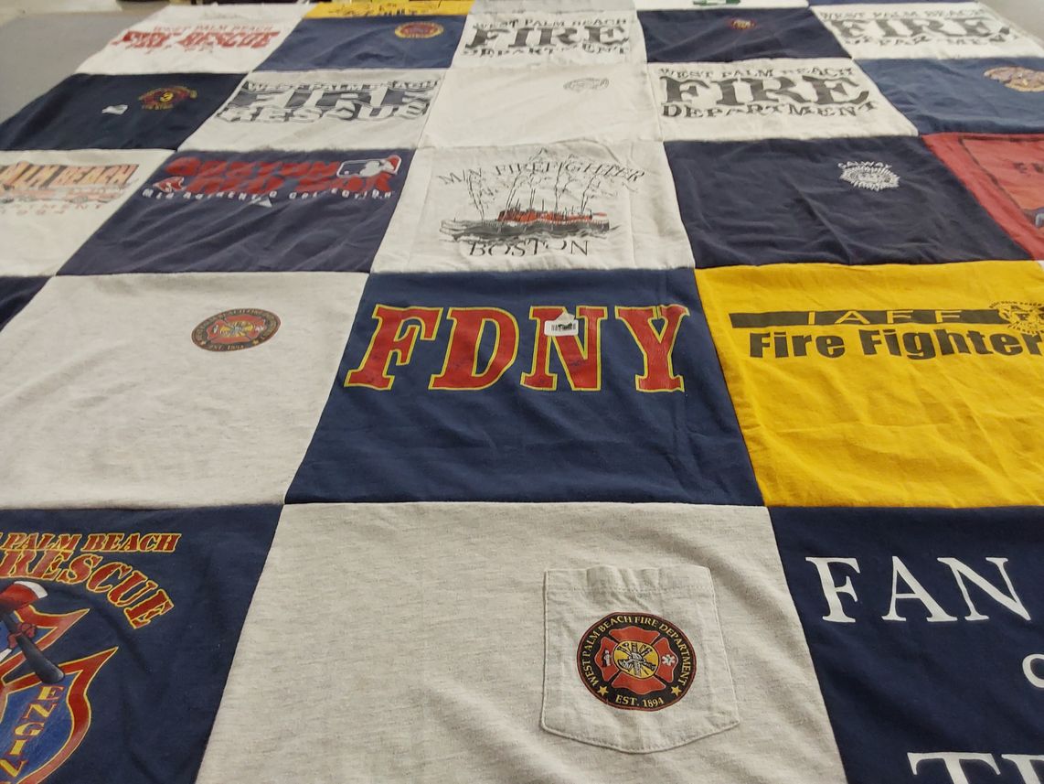 T-shirt quilt with firefighting, emergency services themes by patricia from FL