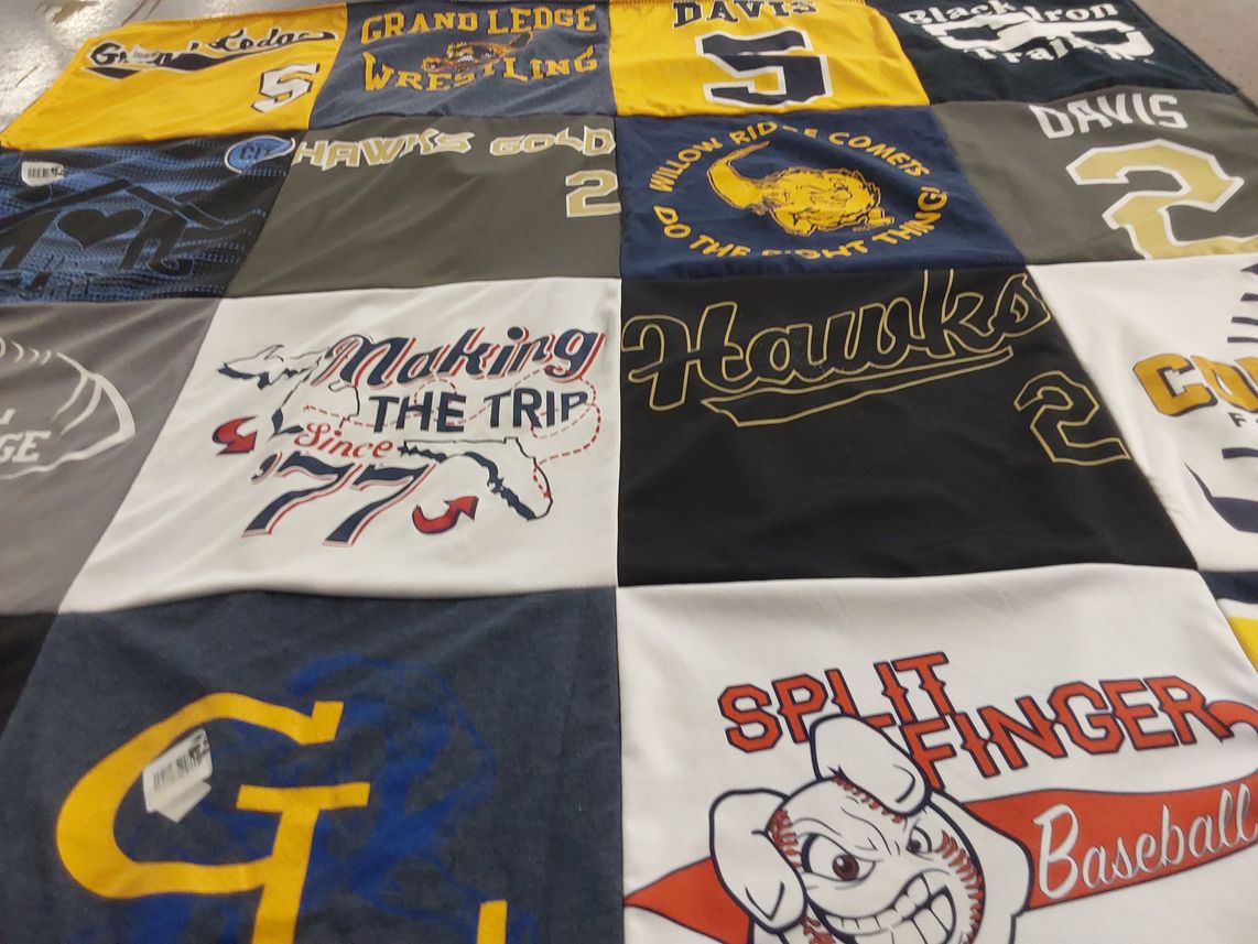 T-shirt quilt featuring hawks, gold hawks by Susan from MI
