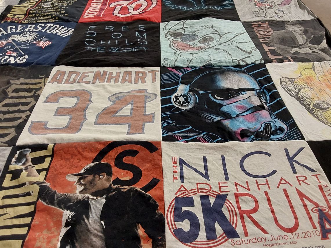 T-shirt quilt with music, running themes by Robin from MD