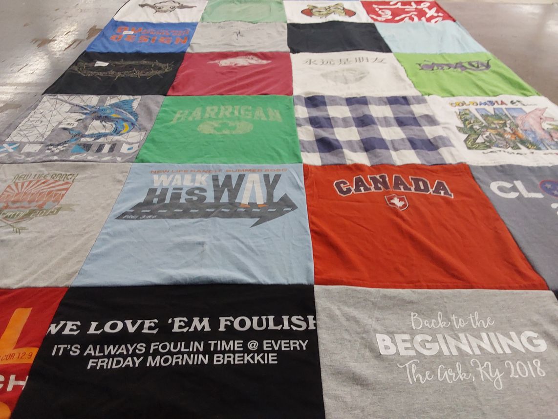 T-shirt quilt with summer camp, community gatherings themes by Lydia from AR