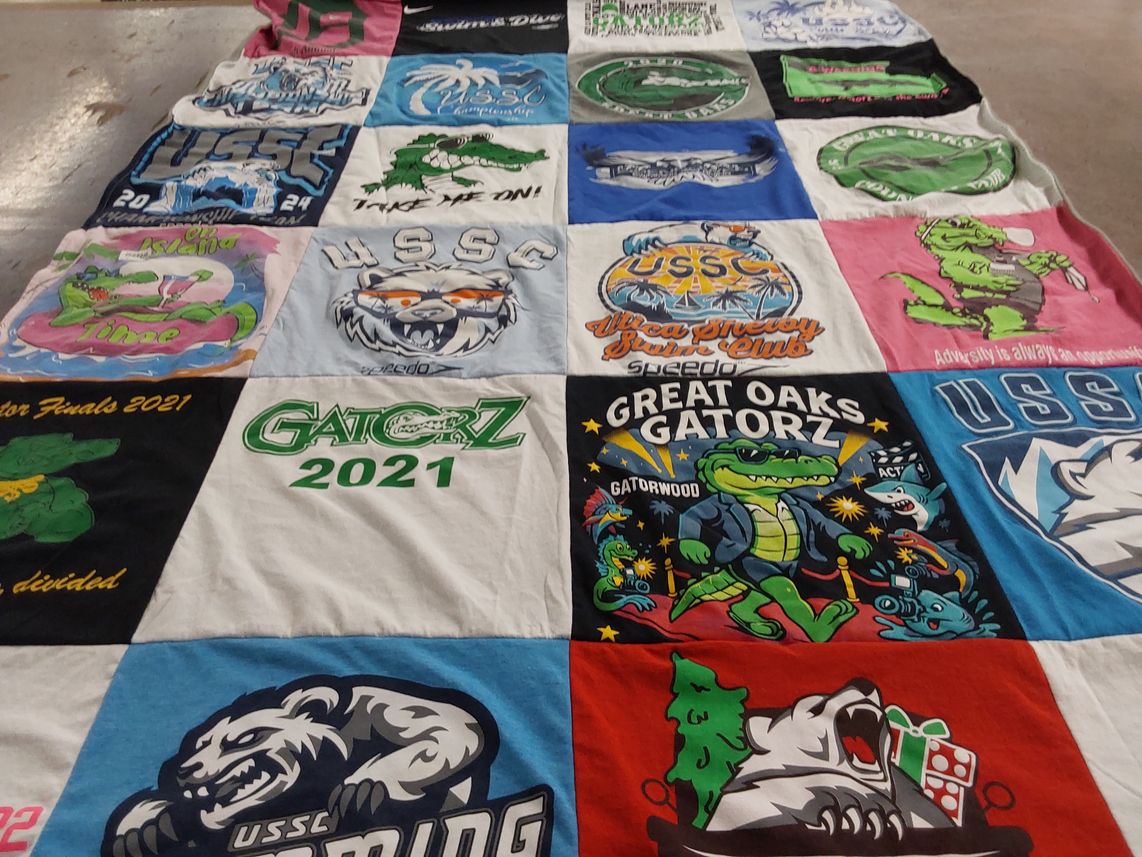 T-shirt quilt with swimming themes by Amy from MI