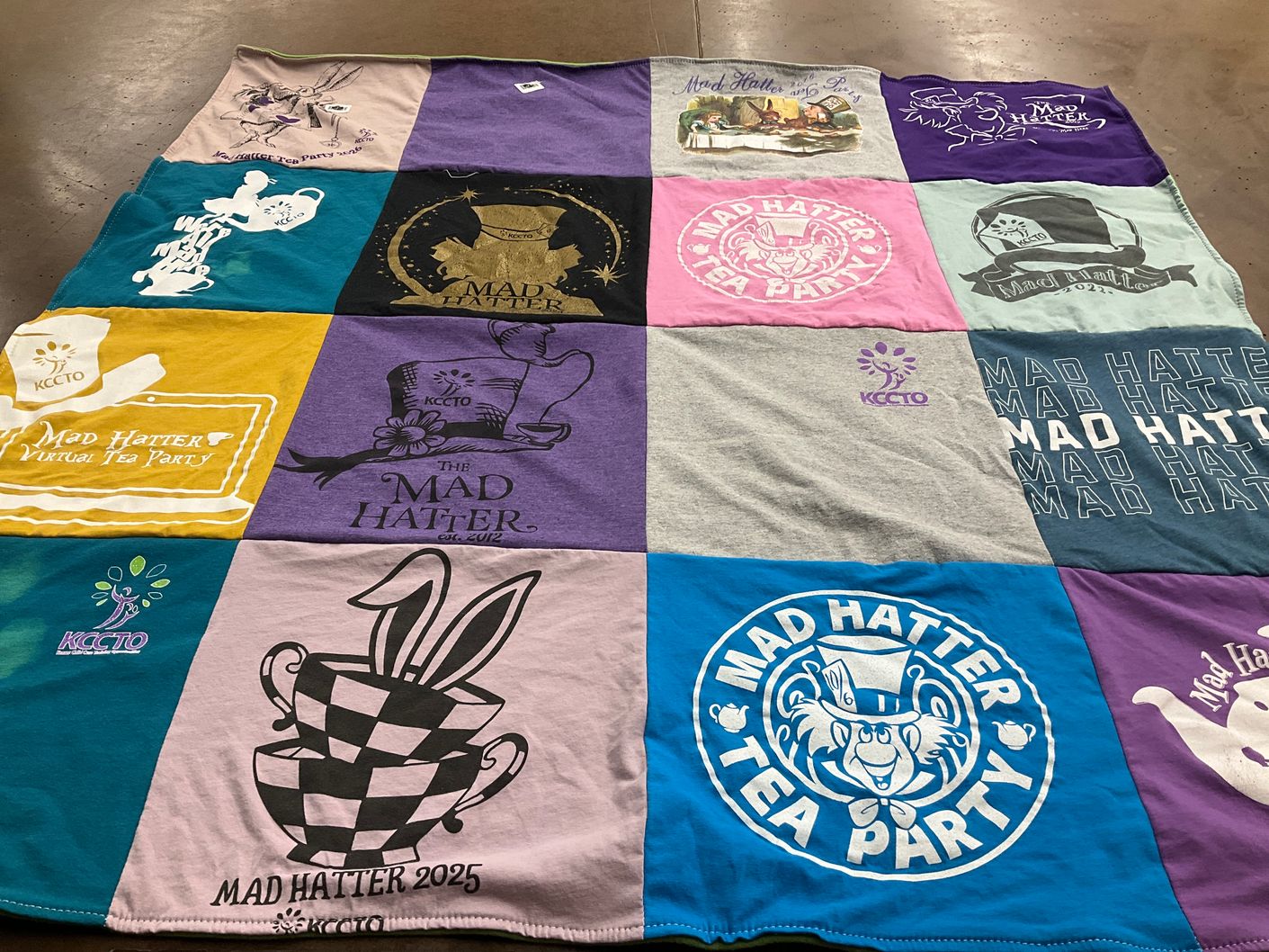T-shirt quilt with disney, alice in wonderland themes by Linda from KS