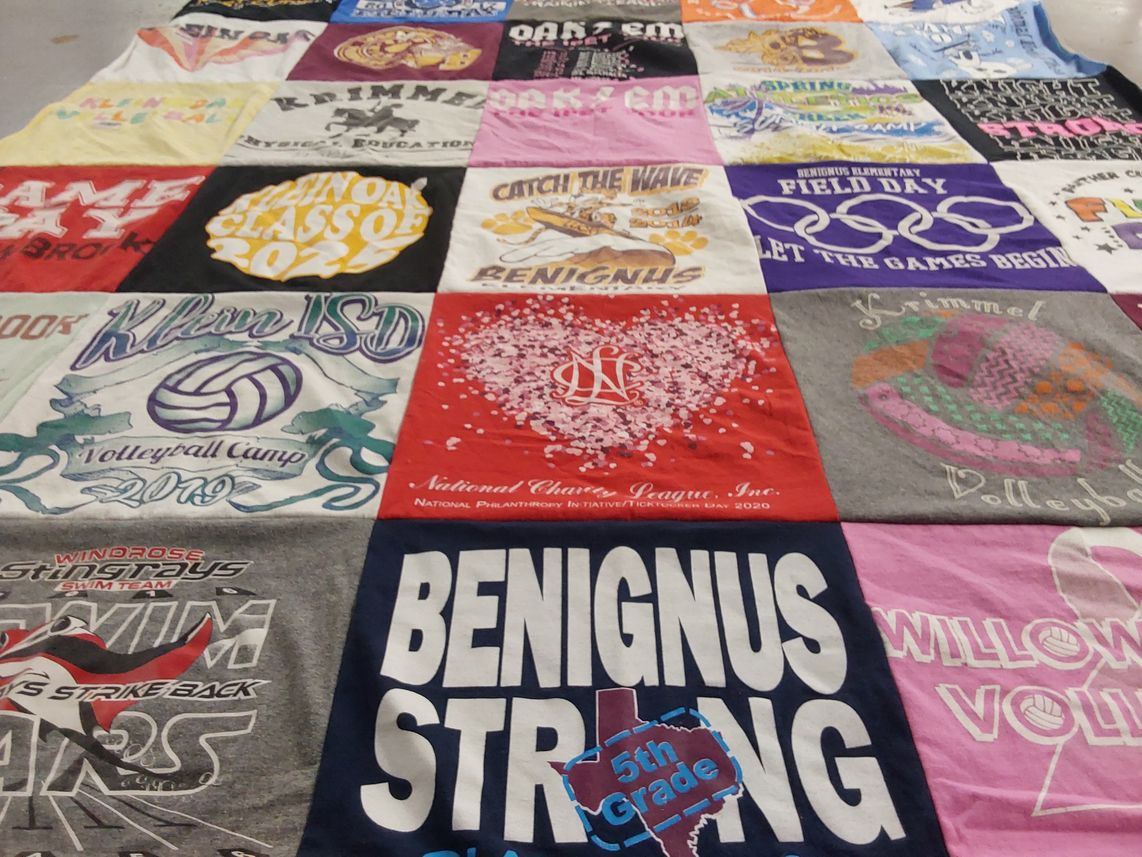 T-shirt quilt featuring windrose stingrays swim team by Amanda from TX