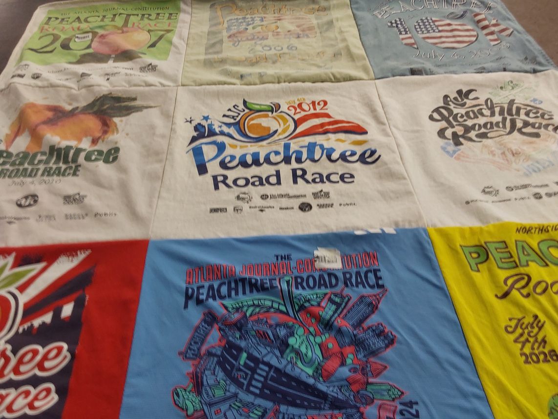 T-shirt quilt with running, marathons themes by Nancy from GA