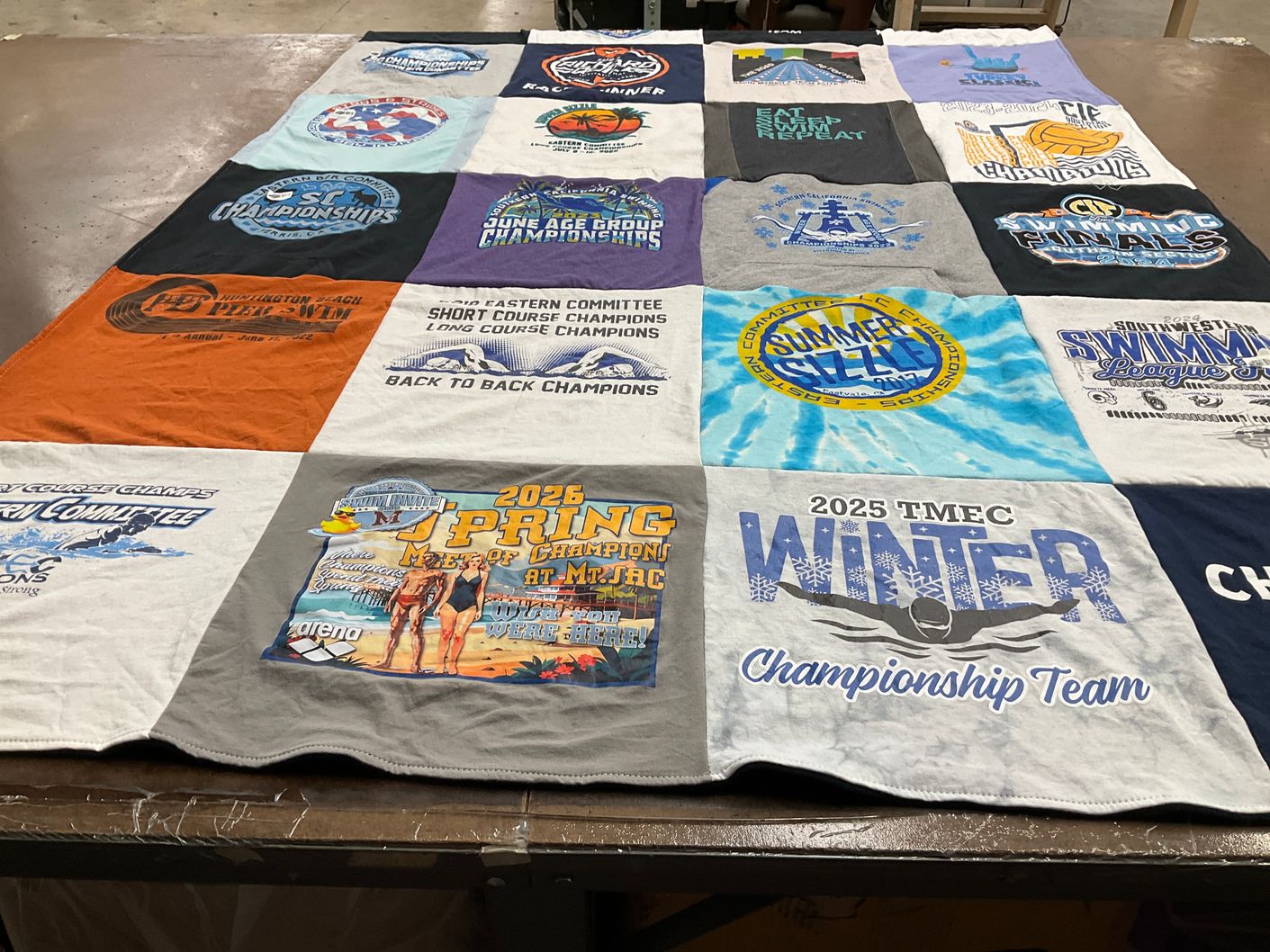 T-shirt quilt with swimming, sports themes by Jessica from CA