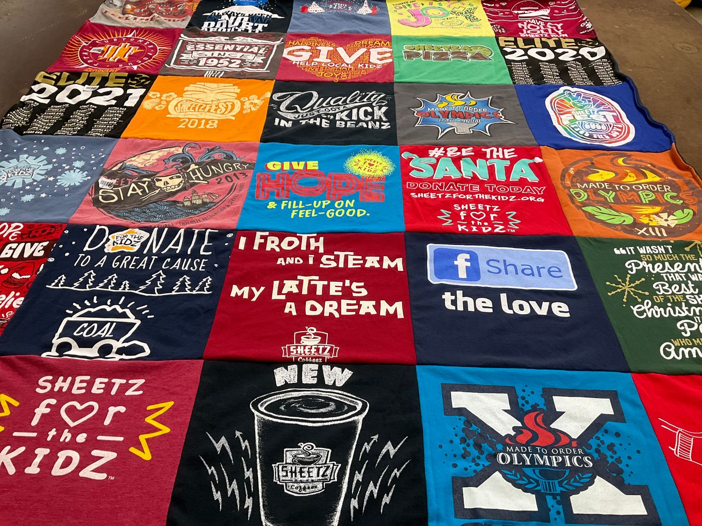 T-shirt quilt with charity, community service themes by Karen from PA