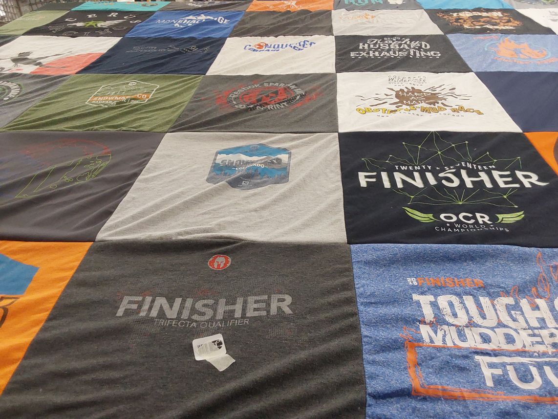T-shirt quilt with obstacle course racing themes by Nichole from CO