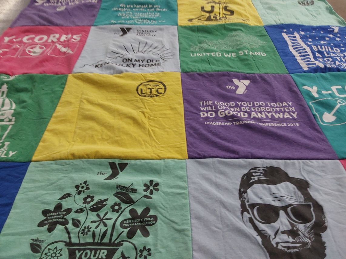 T-shirt quilt with community service, youth development themes by Mary from KY