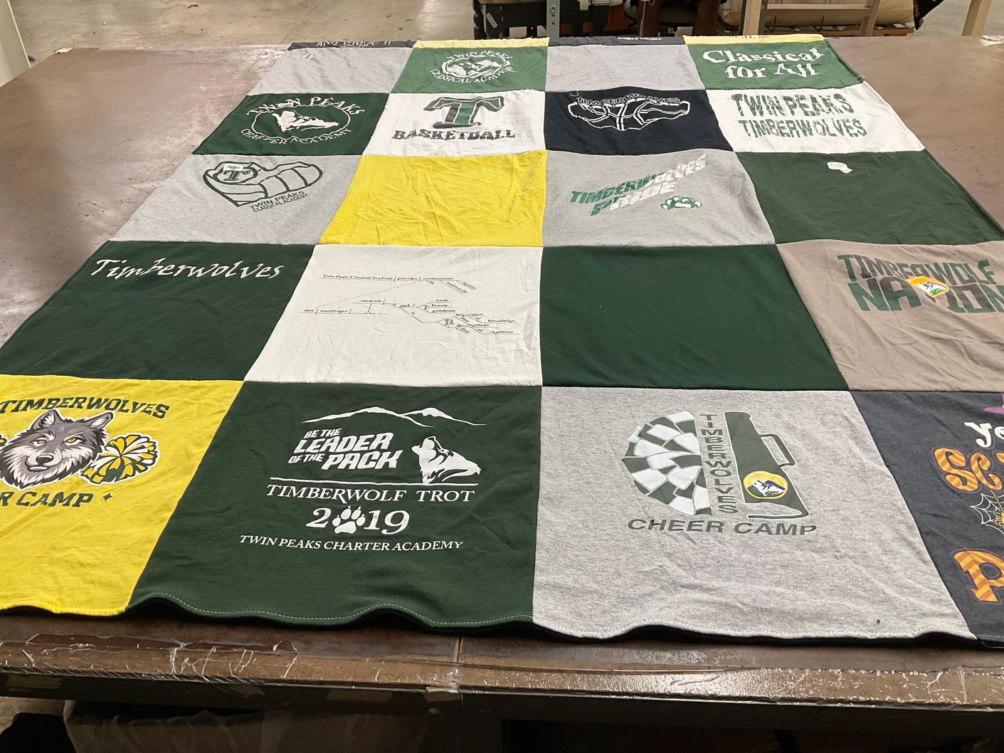 T-shirt quilt featuring twin peaks timberwolves by Amber from CO