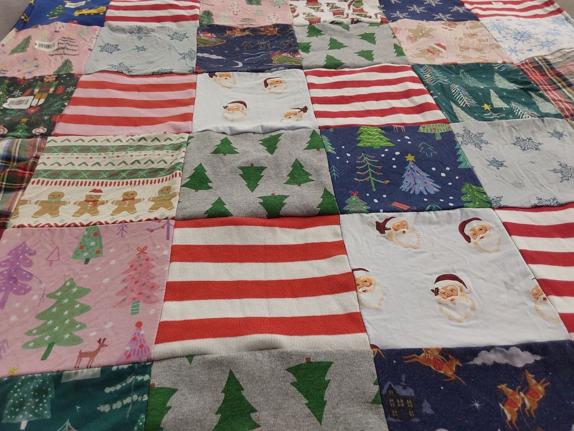 T-shirt quilt with holiday, christmas themes by Kelsea from NH