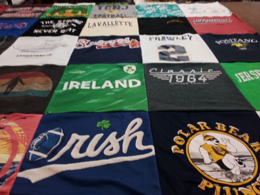T-shirt quilt with football, traveling themes by Angela from NJ
