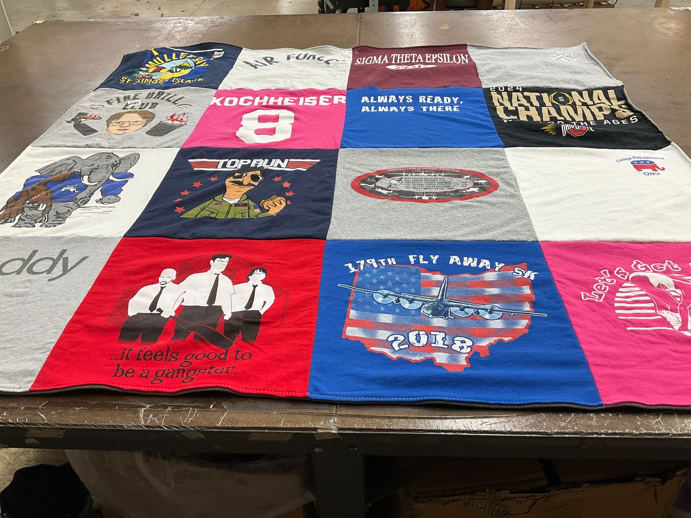 T-shirt quilt with military, fraternity themes by Suzanne from OH