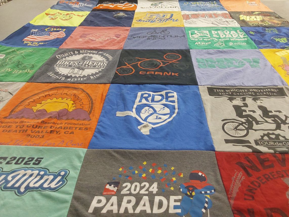 T-shirt quilt with cycling, outdoor activities themes by Paul from IN