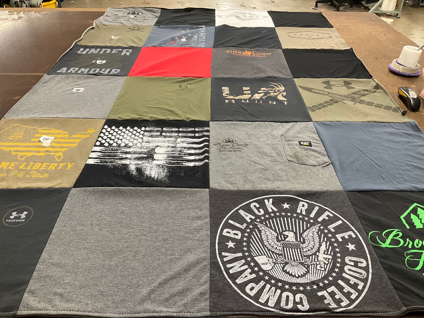 T-shirt quilt with hunting, patriotism themes by Jennifer from WI