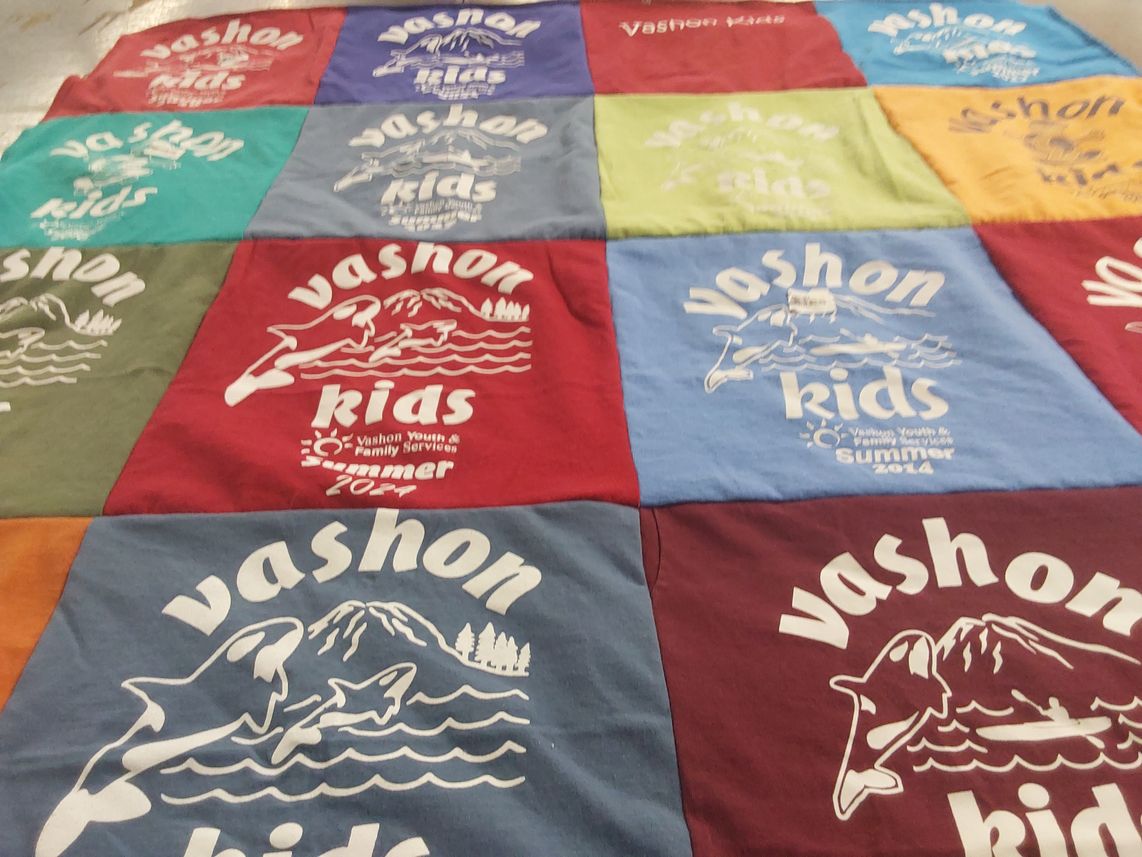 T-shirt quilt with youth activities, family services themes by Karen from WA