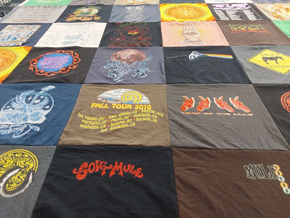 T-shirt quilt with music, concerts themes by Neil from CO
