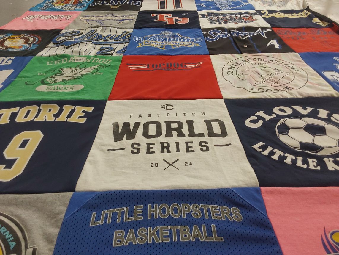 T-shirt quilt featuring clovis little kids, cedarwood hawks by vivian from CA
