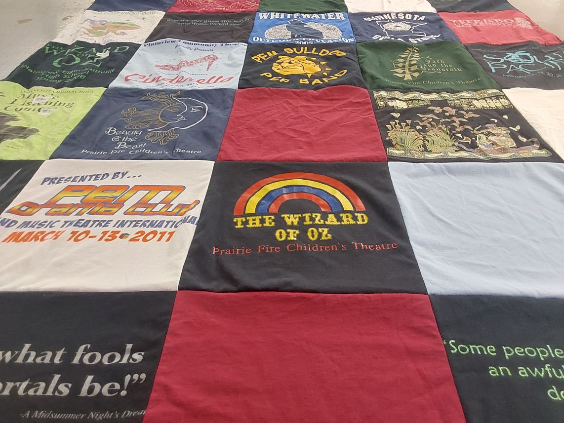 T-shirt quilt with theatre, musicals themes by Karen from MN