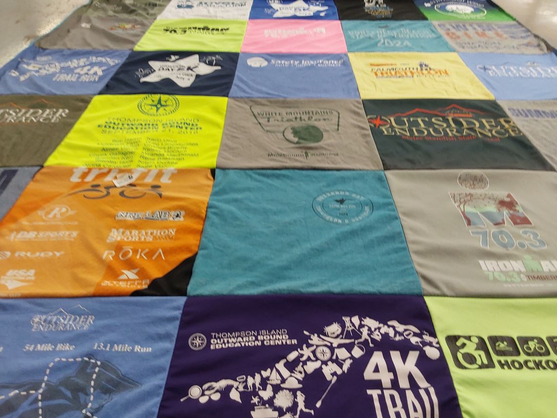 T-shirt quilt with running, biking themes by Scott from MA