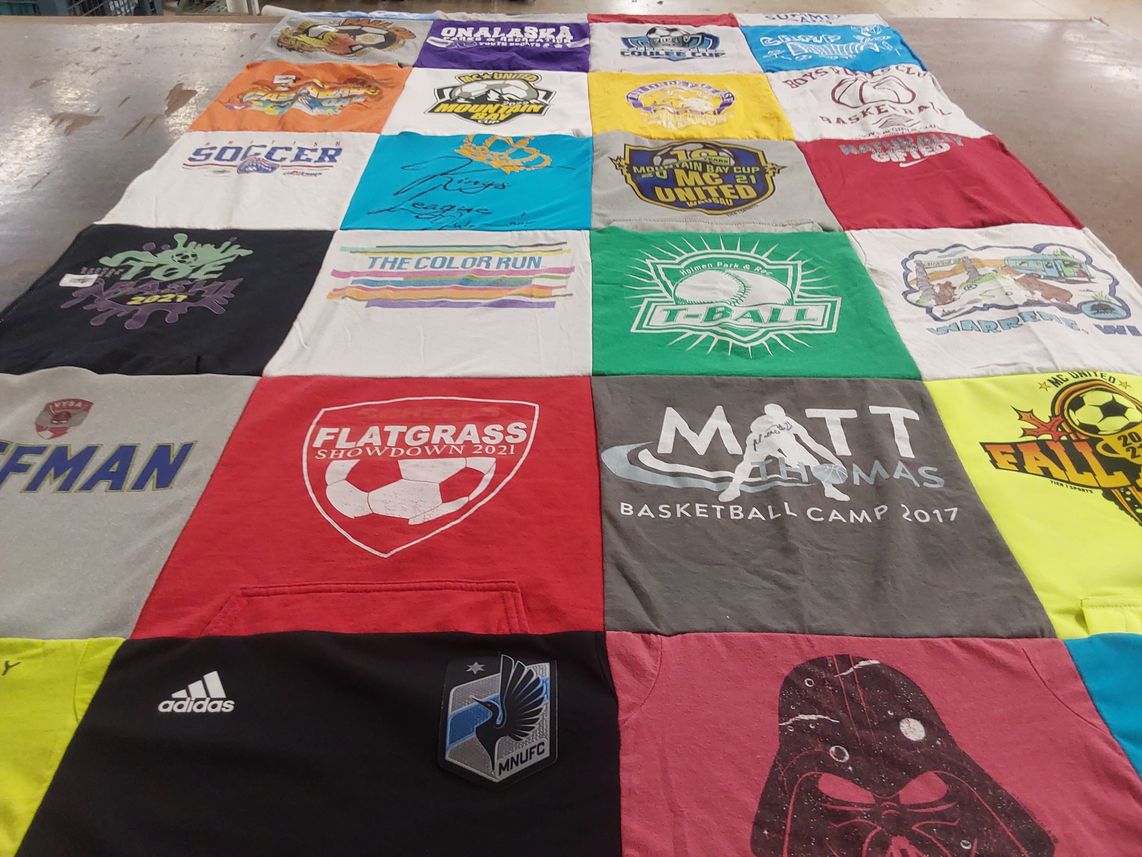 T-shirt quilt with soccer, basketball themes by Nikole from WI