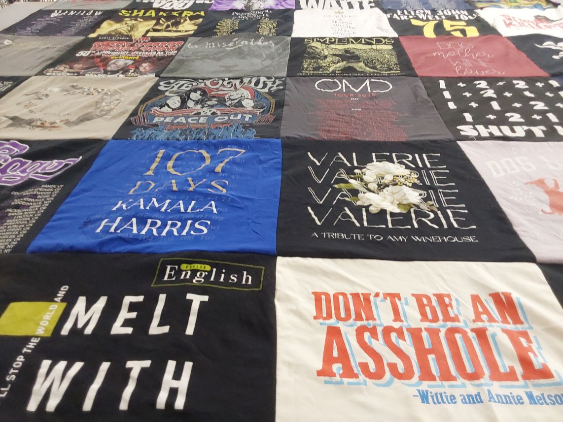 T-shirt quilt with politics, music themes by Vicki from CA