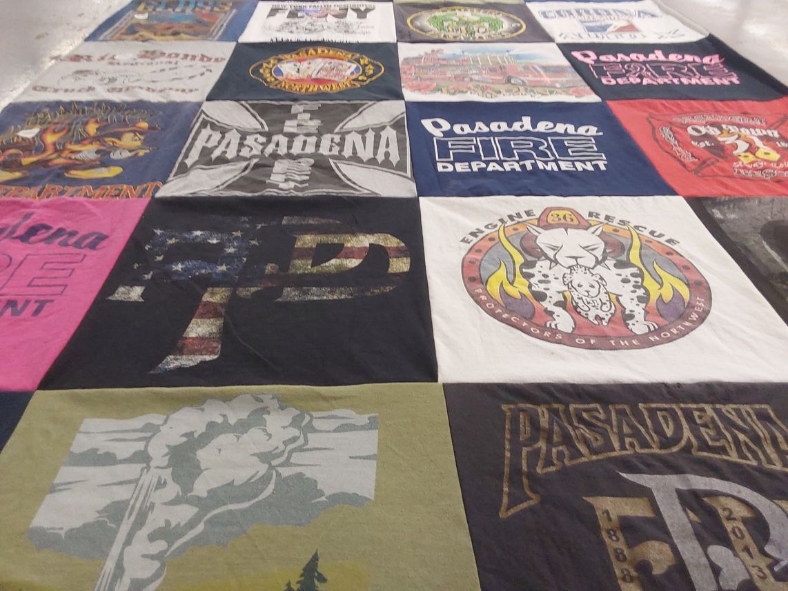 T-shirt quilt with firefighting, community service themes by Emilio from CA