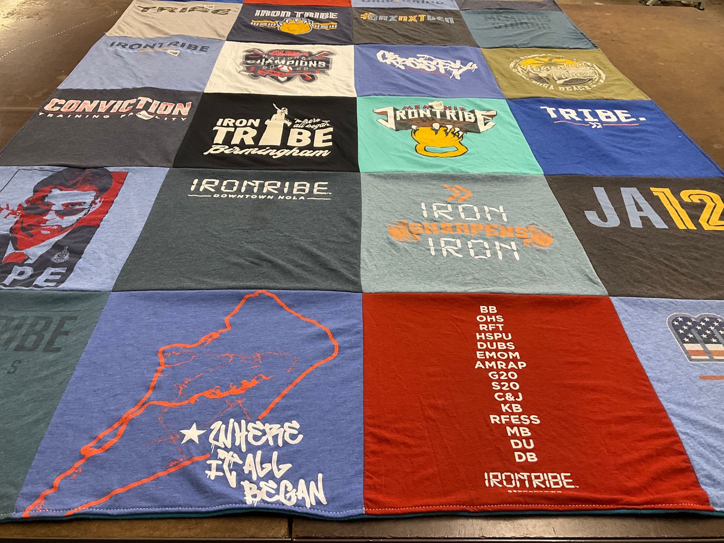 T-shirt quilt with fitness, training themes by Ed from TN