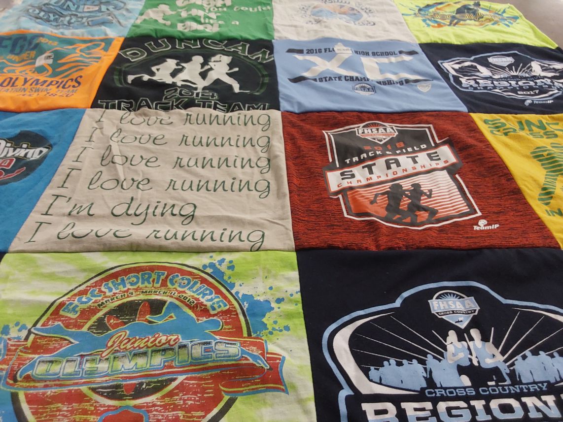 T-shirt quilt with running, track and field themes by Lisa and Scott from FL