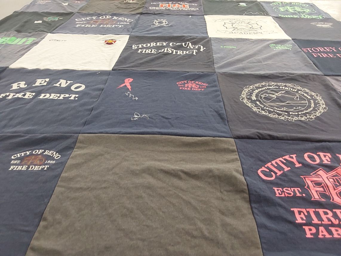 T-shirt quilt with firefighting, community service themes by Paul from NV