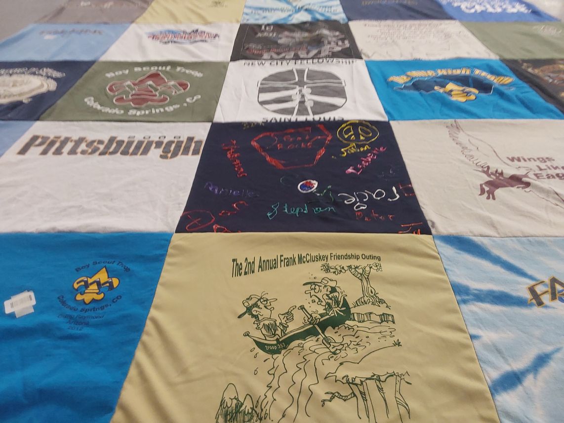T-shirt quilt with scouting themes by Maureen from CO