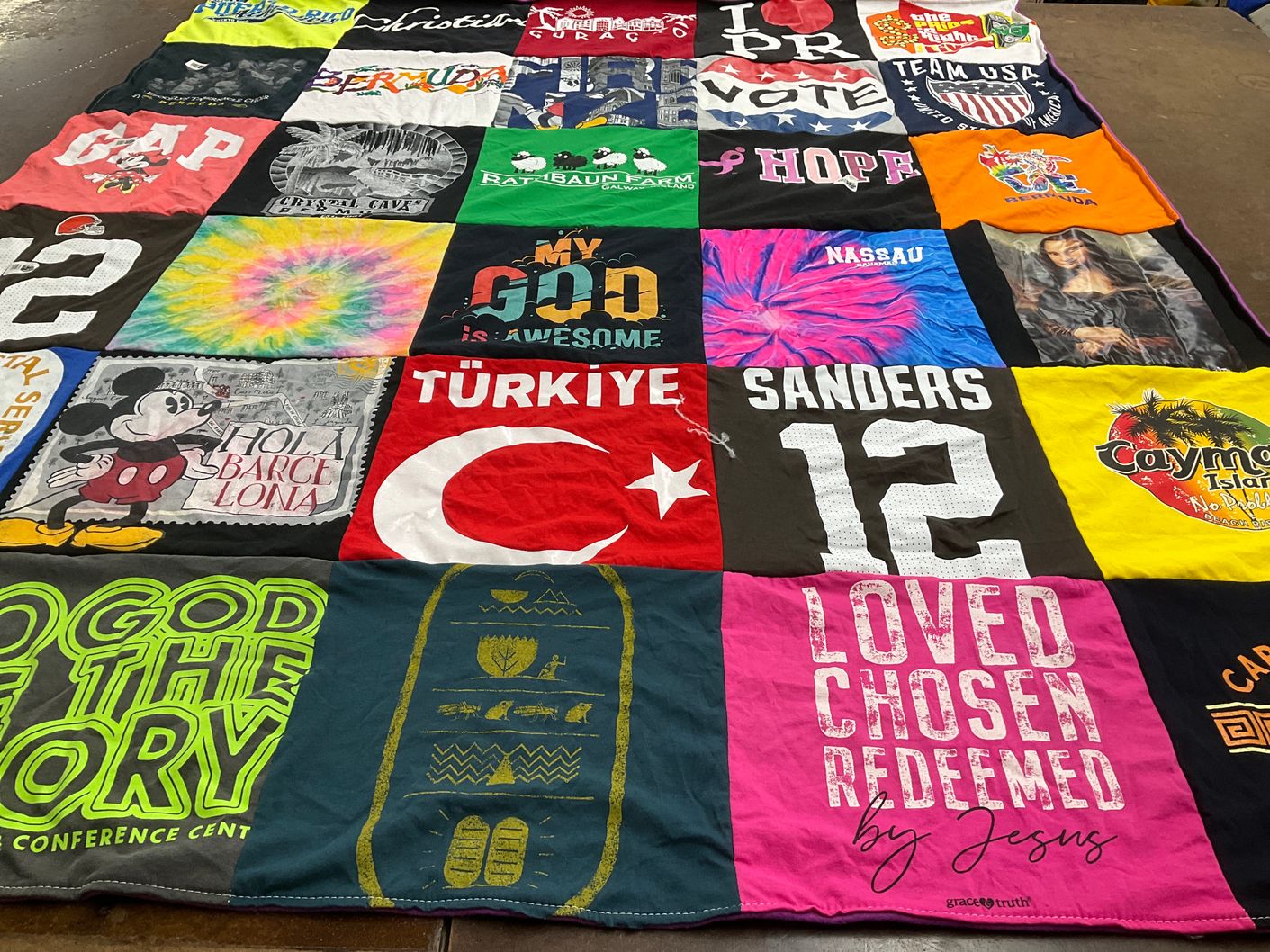 T-shirt quilt with travel, faith themes by Doris from NY