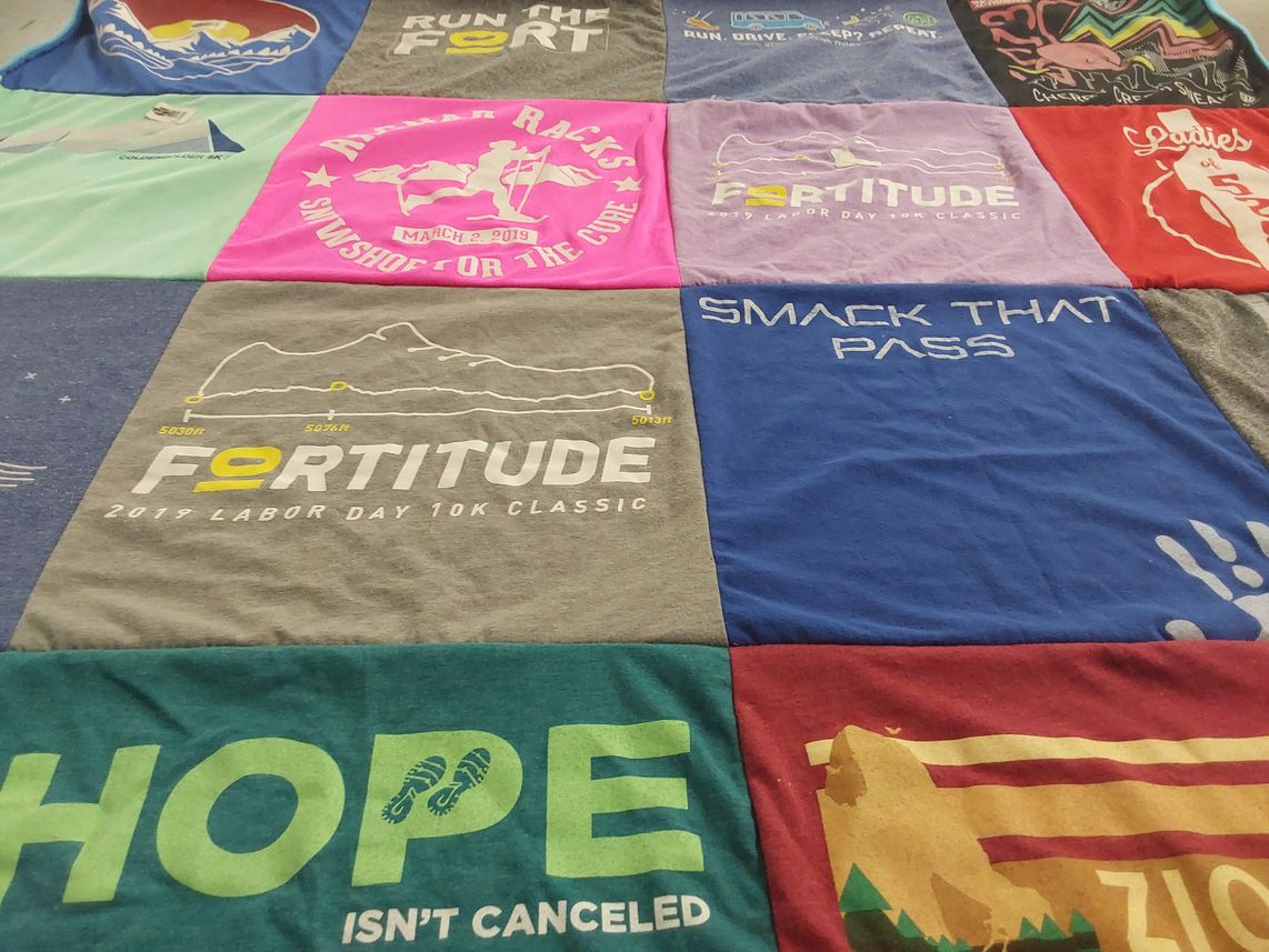 T-shirt quilt with running, community events themes by Heather from CO