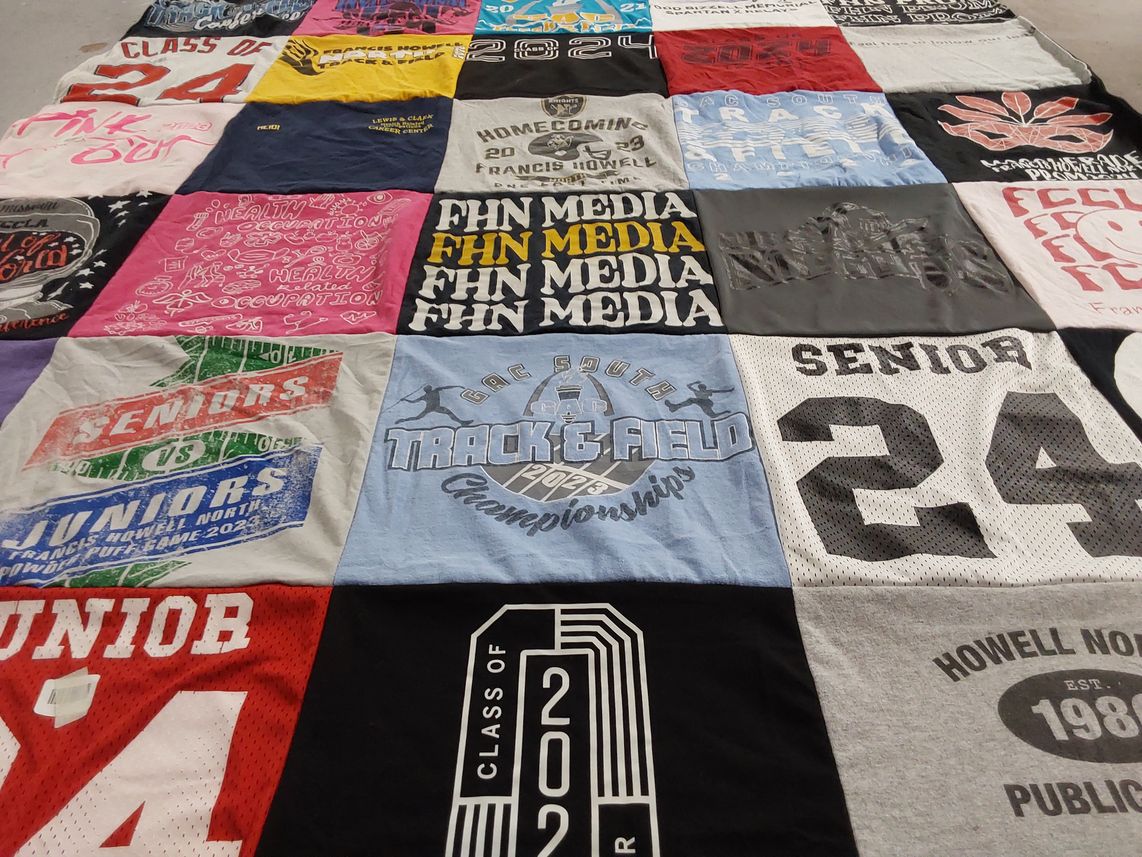 T-shirt quilt featuring howell north track and field team by Heidi from MO