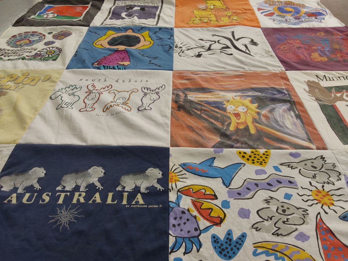 T-shirt quilt with travel, art themes by Lisa from NC