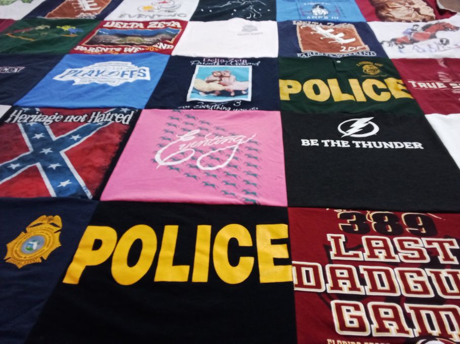 T-shirt quilt with sports, community themes by Gail from FL