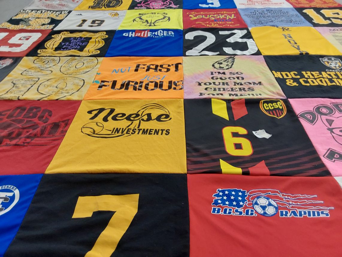 T-shirt quilt with sports, soccer themes by Anita from OH