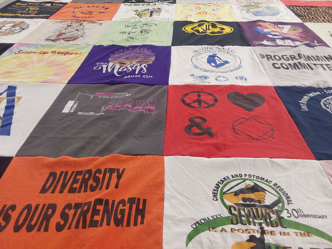 T-shirt quilt with community service, activism themes by Ruben from NJ
