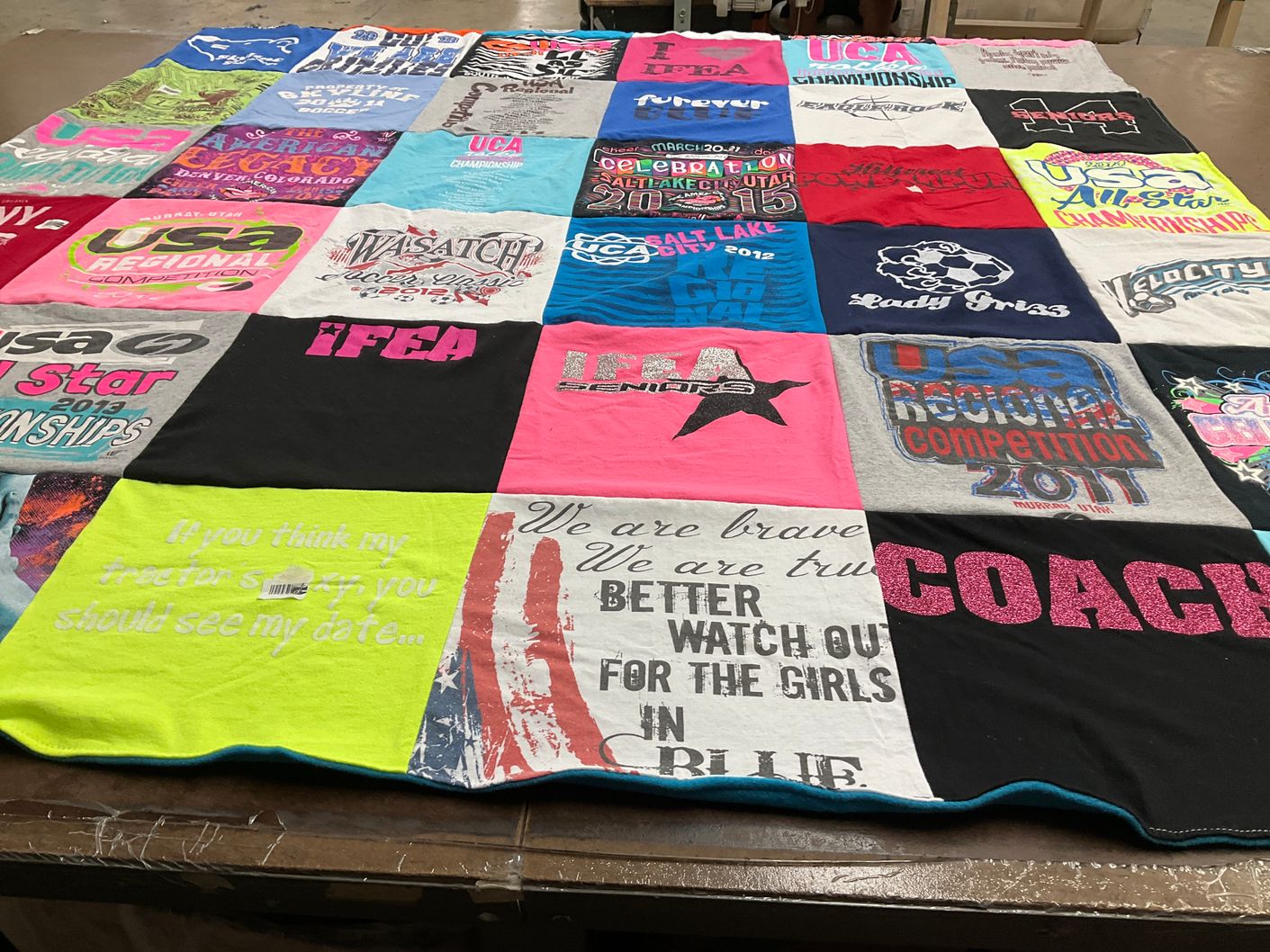 T-shirt quilt with cheerleading, competitions themes by Jeanne from ID