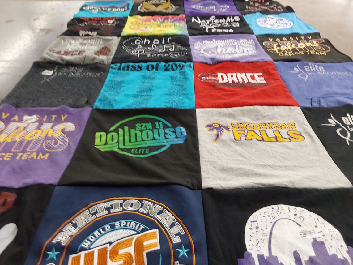 T-shirt quilt featuring varsity dance team by Nicole from WI