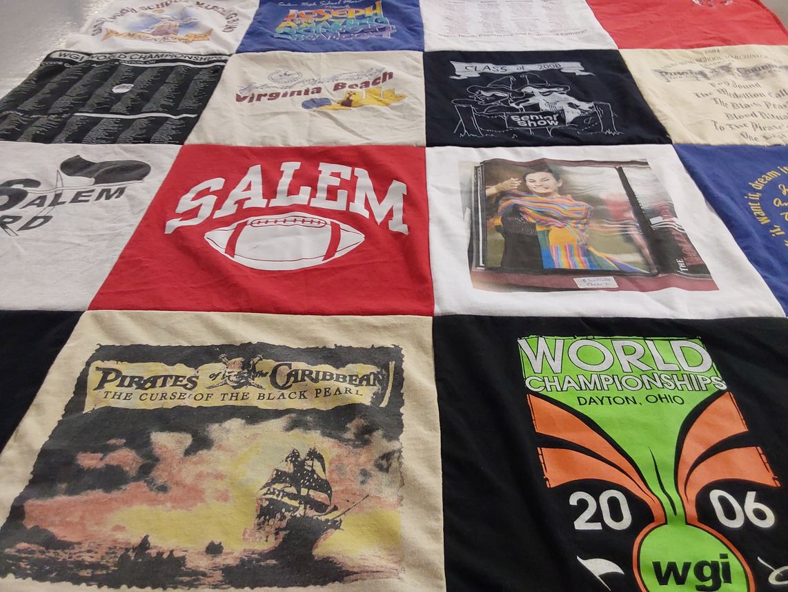 T-shirt quilt with sports, movies themes by Kim from MA