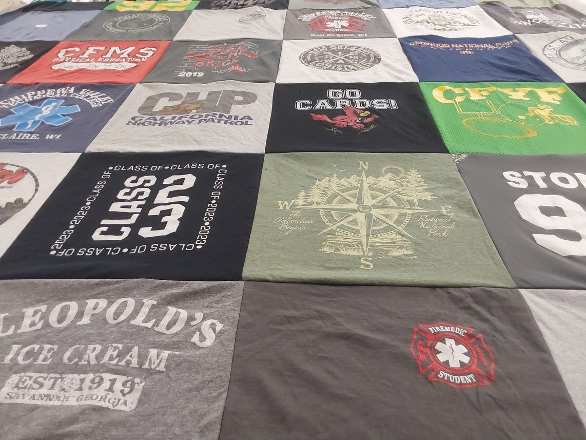 T-shirt quilt featuring cards by Tammy from WI