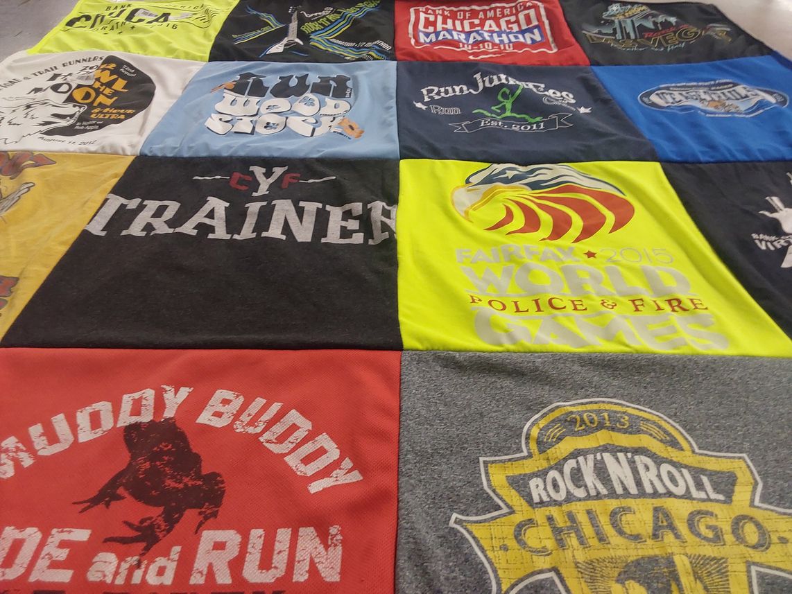 T-shirt quilt with running, fitness themes by Sally from IL