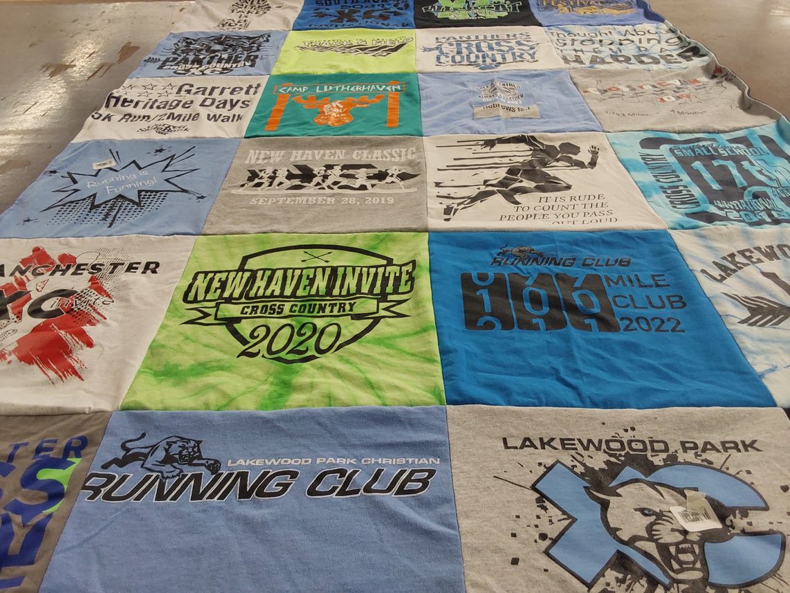 T-shirt quilt featuring lakewood park christian running club by Angela from IN